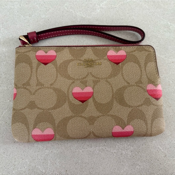 Coach Handbags - Coach Corner Zip Wristlet In Signature Canvas With Stripe Heart Print Luxury